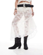 Roan western heeled boots with stones in black