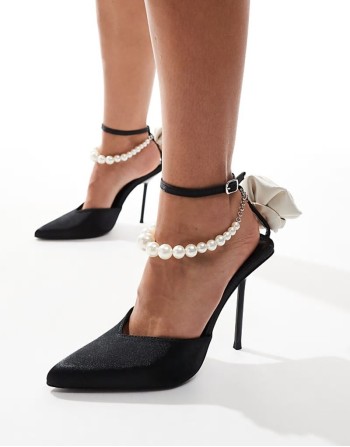 Sariah pointed heels in black with pearl ankle strap and corsage detail