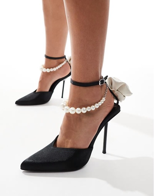 Sariah pointed heels in black with pearl ankle strap and corsage detail