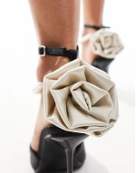 Sariah pointed heels in black with pearl ankle strap and corsage detail