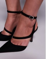 Past high heeled shoes in black suedette