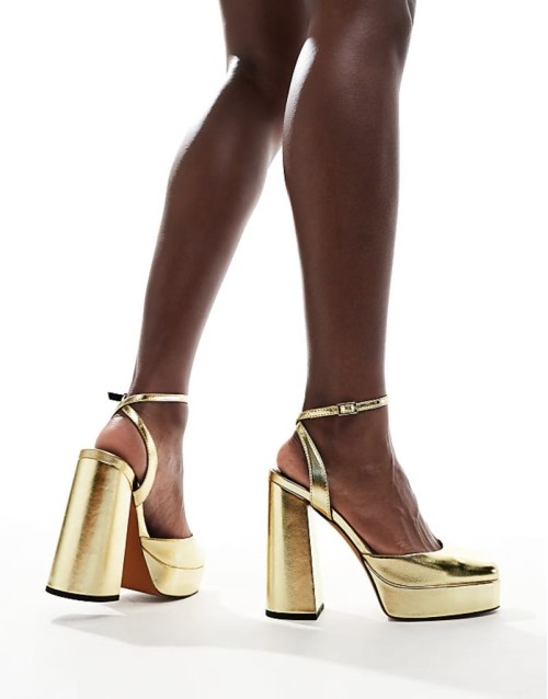 Pressure platform high heeled shoes in gold