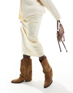real suede heeled fold over western boot in beige