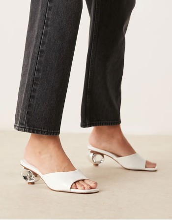 Holbrook metal heel detail heeled mules in white